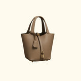 Sac à main seau en cuir Cuiraya